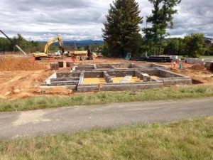 Standing water filled foundations at a Washington and Lee construction site. Photo by Rachel Stone.