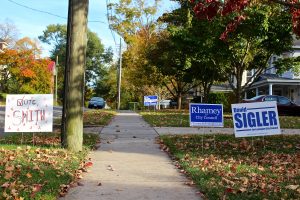 Lexington Residents show their support for all four City Council candidates. Only three will secure seats on Election Night. Photo by Samantha Yates