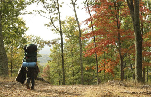 A hiker on House Mountain in Lexington.
