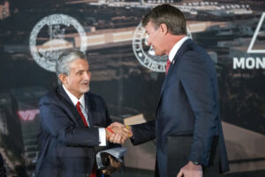 Ted Leonsis and Glenn Youngkin shaking hands