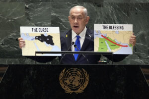 Benjamin Netanyahu speaks at a podium at the United Nations General Assembly.