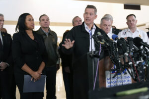 Photo of Sean Duffy speaking at a news conference at the Ronald Reagan Washington National Airport.
