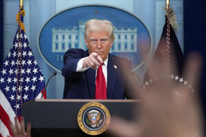 President Donald Trump calls on a reporter to ask a question.