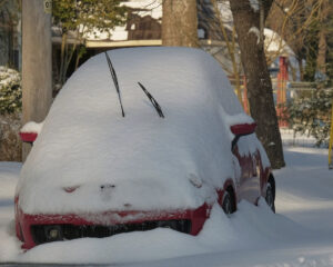 Photo of a small car covered in snow in Elizabeth City, N.C.