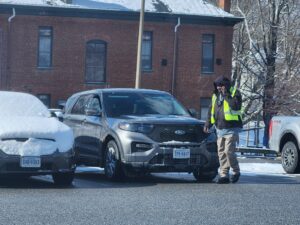 Photo of Reginald Turner walking to his car.