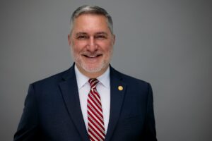 Headshot of John Reid.