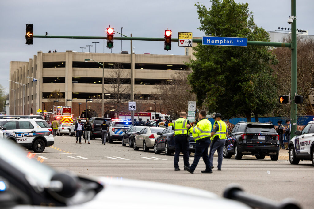 Emergency officials gather outside Old Dominion University's campus after reports of an active shooter.